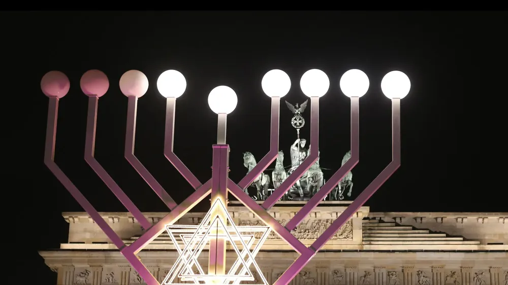 Menorah during Hanukkah in front of Brandenburg Gate